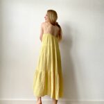 organic cotton midi women’s dress with flowing design and shoulder straps, ideal for warm weather and casual chic looks.