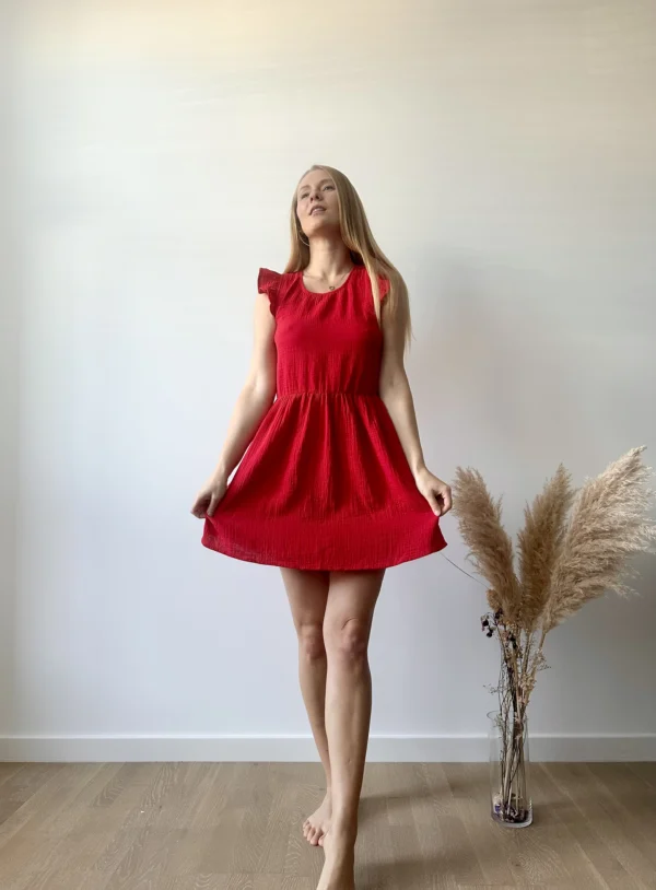 Light cotton muslin dress above the knee