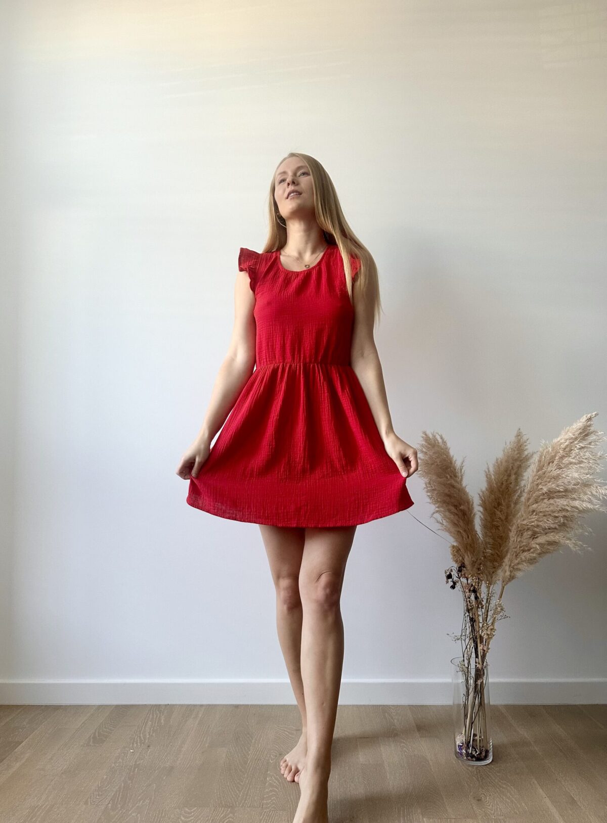 Light cotton muslin dress above the knee
