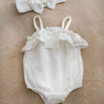 White muslin romper with no sleeves for baby girls