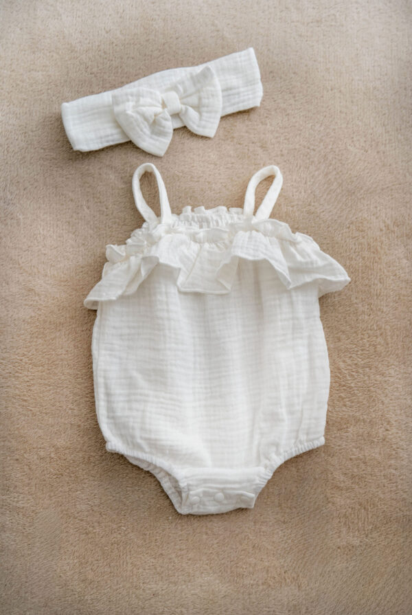 White muslin romper with no sleeves for baby girls