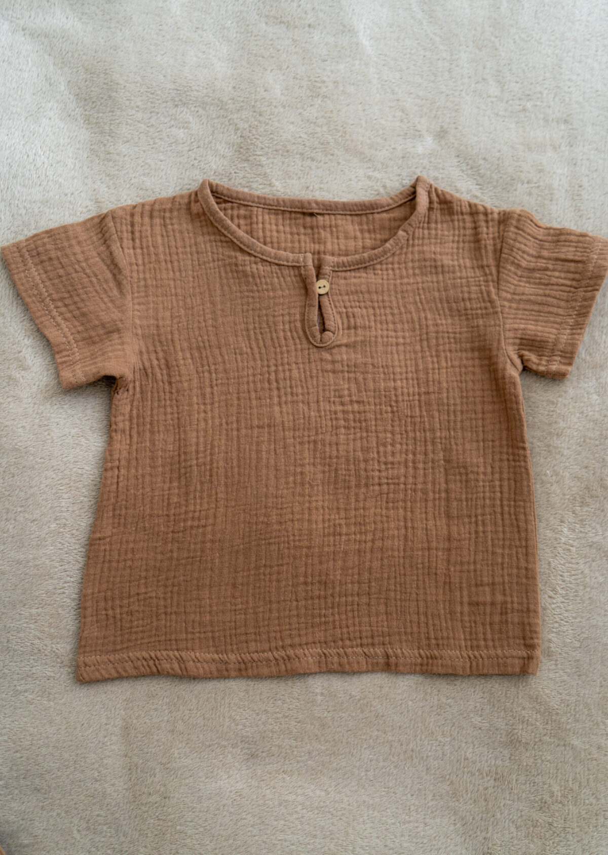 handmade muslin top with wooden button