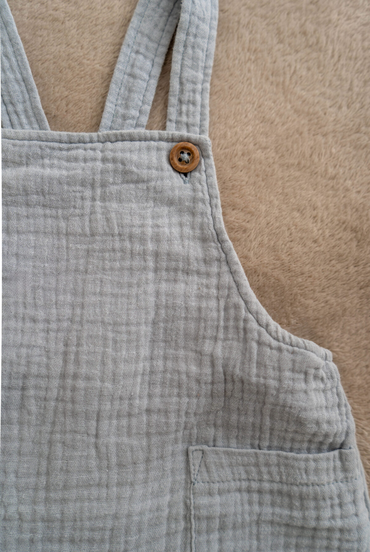 Babies' playsuit sleeveless made of organic cotton